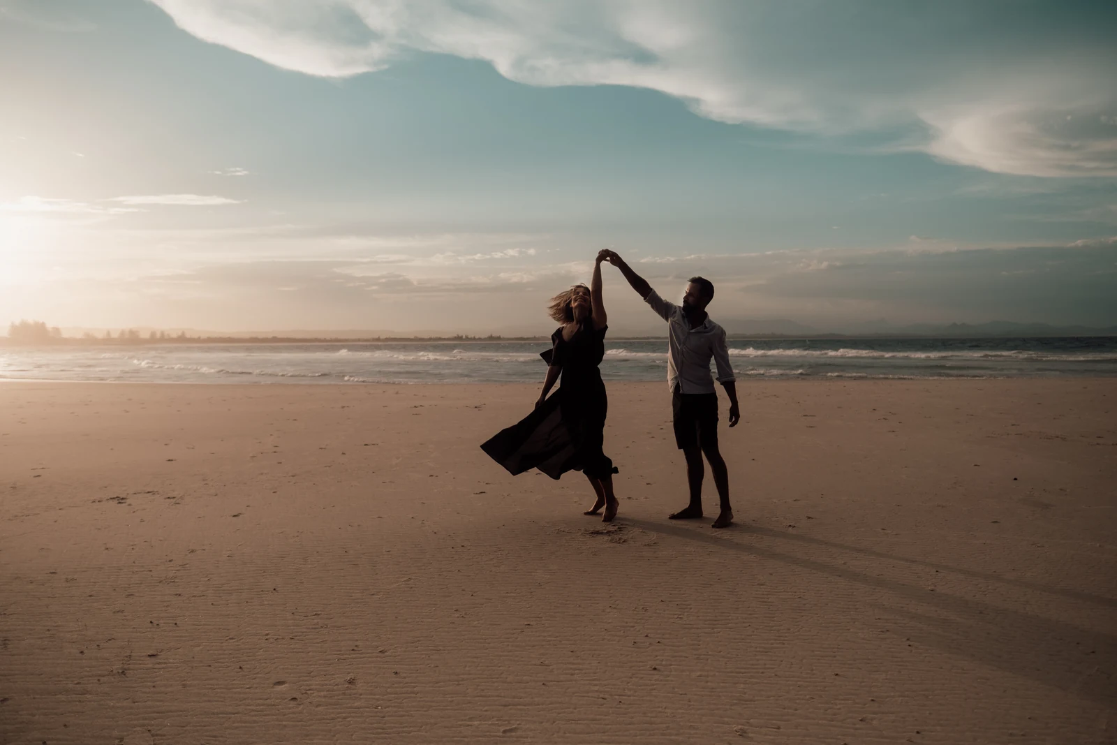 Portrait capturing movement and expression on the beach