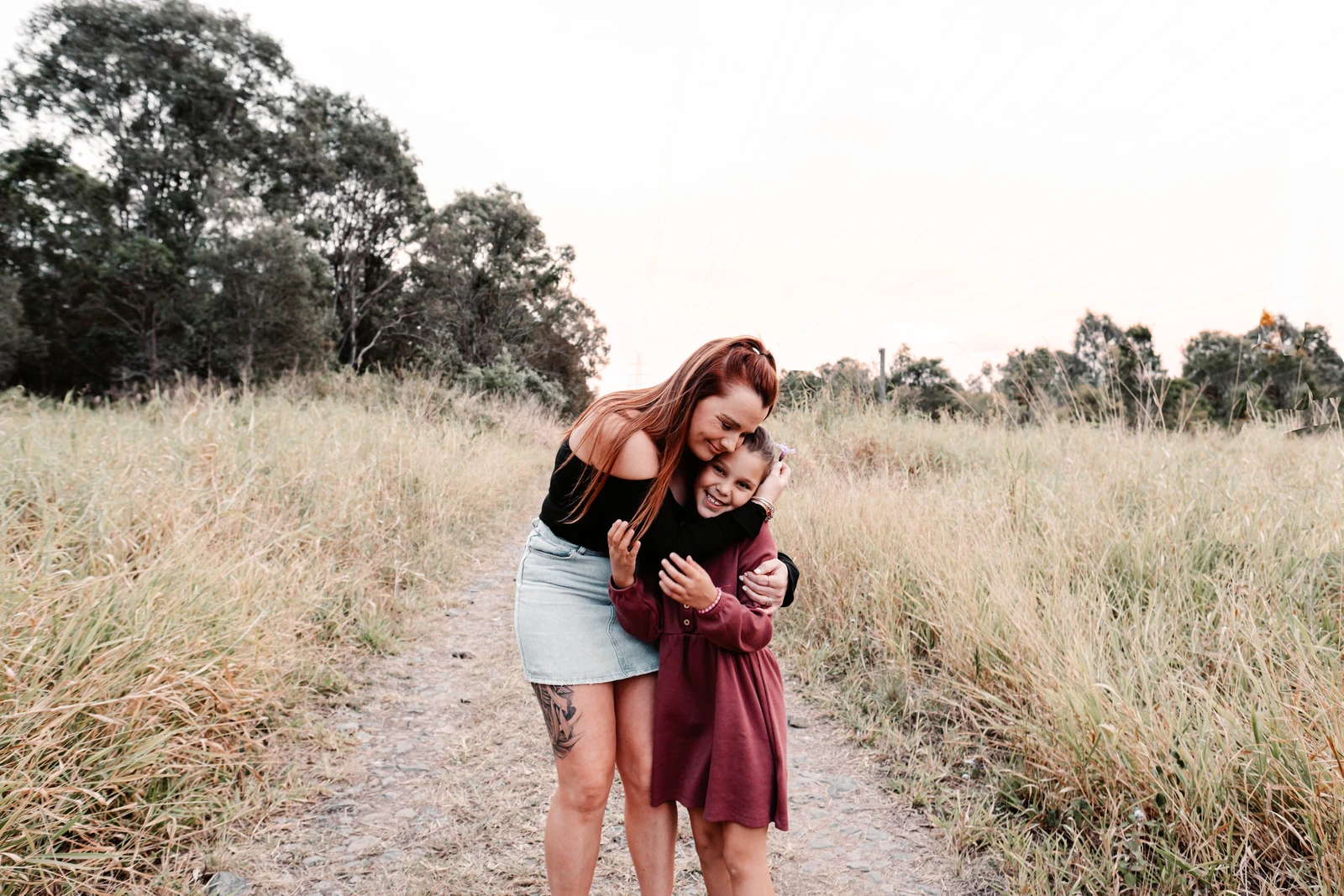 Stepmum hugging her stepdau