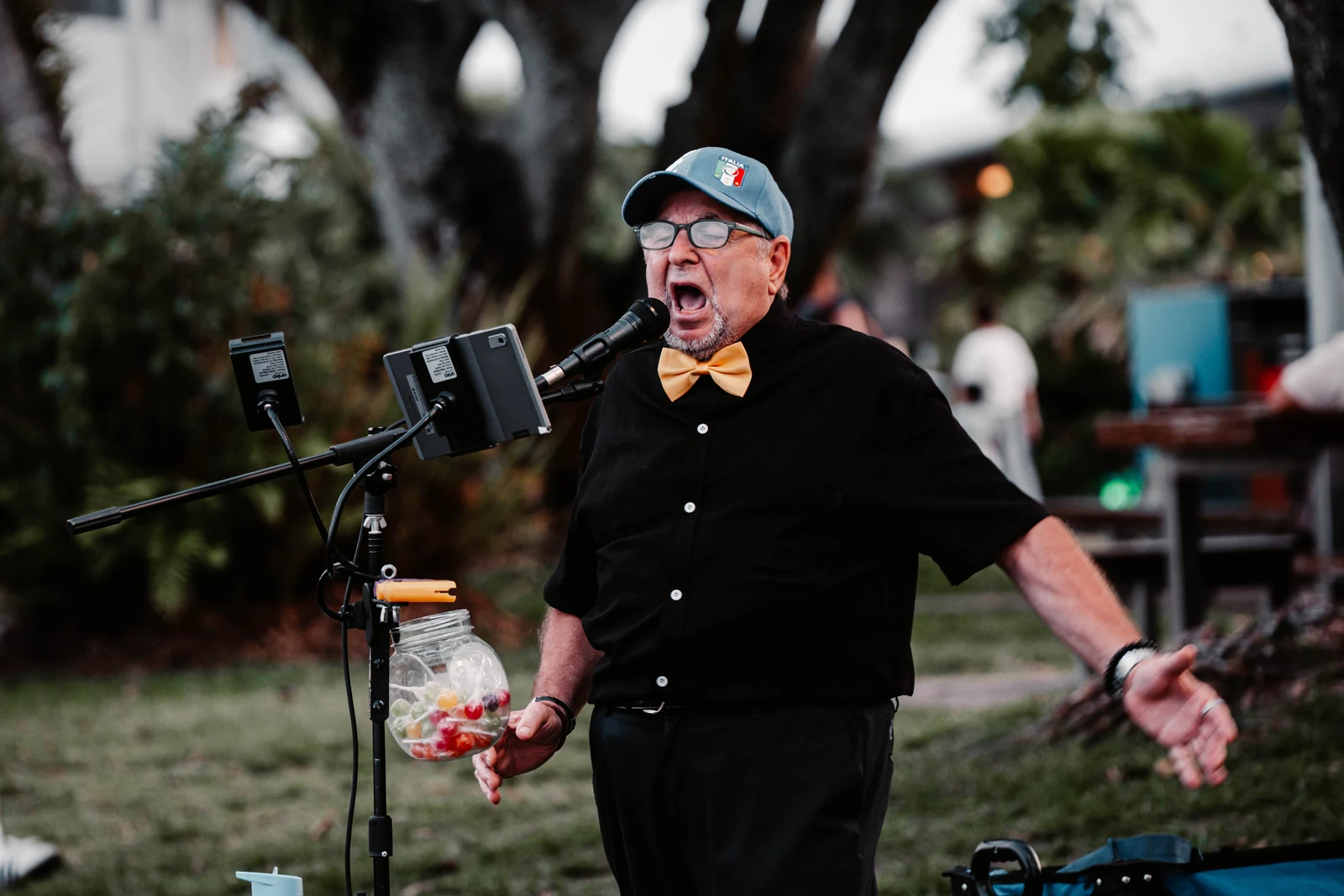A singer performing outdoors in Cairns