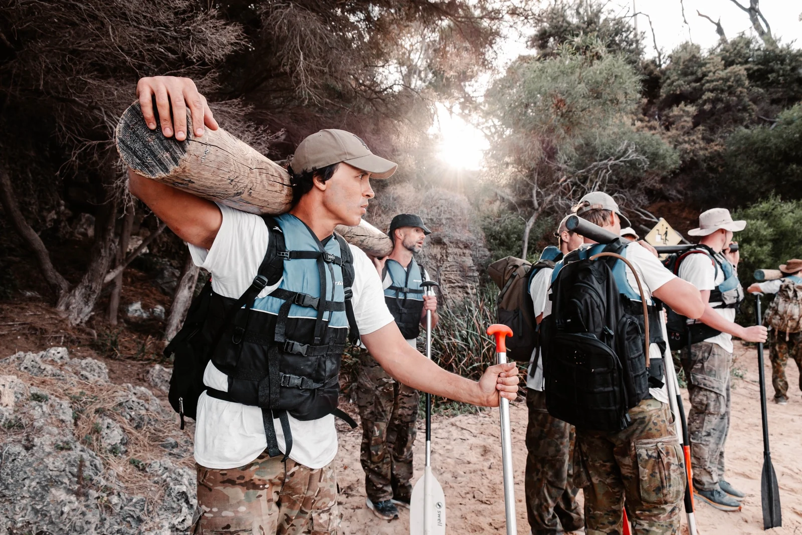 Teammates working together outdoors
